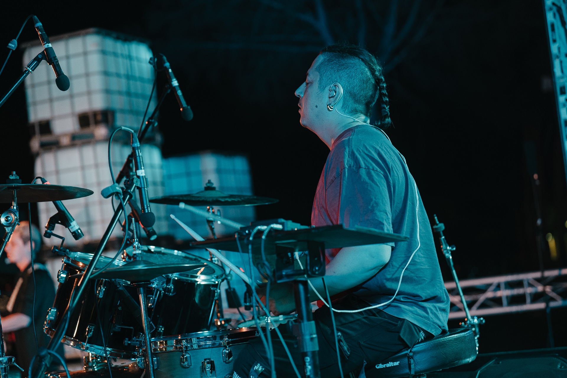 ANAEVE drummer in blue stage light