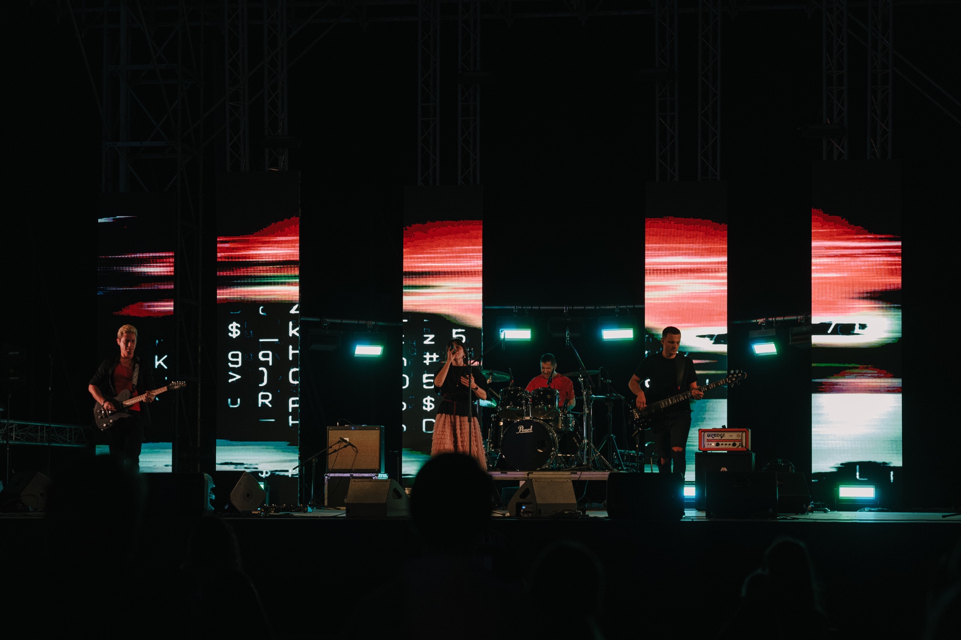 ANAEVE full band on stage with red LED panels